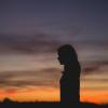 silhouette of person at sunset