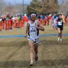 PhD student and instructor Alex Wolf-Root, also a former collegiate track athlete, runs in race