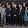 Chancellor poses for photo with alumni award recipients