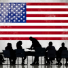 American flag with silhouettes of business people working