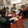 Advisor meets with students in her office