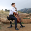 Musician playing cello outside