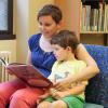A parent reading to a child