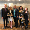 CU Boulder representatives at the APLU conference with award