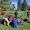 CU community members planting trees in observance of Arbor Day