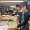 Johnette Martin and Jessica Quah working in the American Music Research Center collections