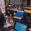 students participate in a hackathon on campus