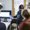 Students show their work during the ATLAS Institute Research Showcase. (Photo by Patrick Campbell/University of Colorado)