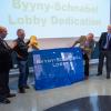Chancellor Phil DiStefano and ATLAS Director Mark Gross join former Chancellor Richard L. Byyny and former ATLAS Director Bobby Schnabel to unveil a sign dedicating the ATLAS lobby in their honor