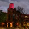 The ATLAS Building towers shines red to honor Coloradans lost to COVID-19 on Friday, May 15, 2020. (Photo by Casey A. Cass/University of Colorado)