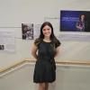 Aubrey Kroger poses by exhibit