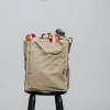 reusable grocery bag filled with canned food