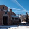 People walk on campus near the UMC.