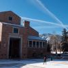 The fountain near the UMC with a dusting of snow, blue skies overhead