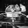 Ball Brothers Orbiting Solar Observatory with employees and rocket parts, 1961-64