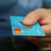 Person pays with debit card
