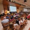 Audience members listen to a presenter during the 2023 BFA awards