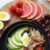 Salad bowl, fruit and a boiled egg