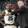 McKinley Wright IV with 10th-year head coach Tad Boyle
