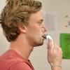 Tom Heinbockel demonstrating using a Power Breathe device