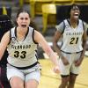 Colorado’s Peanut Tuitele, center, and Mya Hollingshed celebrate a 77-72 win over Stanford on Jan. 17, 2021. (Photo by Cliff Grassmick)