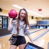 Student bowling at The Connection