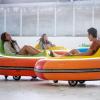Students ride bumper cars on the Rec Center ice rink