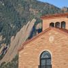 A photo of the C4C building in front of the Flatirons