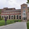 Student walks by Colorado Law building