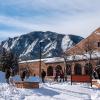 Campus community members outside of the UMC on a snowy day