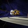 The Cassini spacecraft next to Saturn