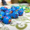 Tiny globe keychains on a table