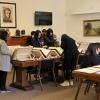 Members of CEAL look through the University Libraries' Asian Studies collection.