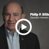 Chancellor Philip DiStefano with video play button overlay