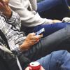 man looking iPhone