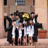Chip, in regalia, joins others in celebrating 2021’s CU Boulder commencement ceremony. (Photo by Glenn Asakawa/University of Colorado)