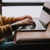person on laptop computer