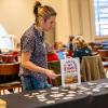 Campus community members visit booths at the Women's Leadership Symposium