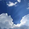 cumulus clouds and a blue sky