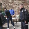 A CUPD officer engaging with students and community members