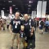 Stevens and CMCI alumnus Christopher Bell pose with Stevens' son