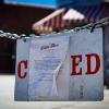 A sign announces the closure of an ice cream shop in Denver at the height of the coronavirus pandemic.