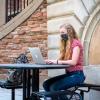 student studying on campus