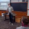 professor teaching while wearing mask 
