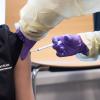 Wardenburg medical staff receive the first of two Moderna COVID-19 vaccinations on Tuesday, January 5, 2021. (Photo by Glenn Asakawa/University of Colorado)