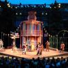 Shakespeare Festival stage with actors performing. 