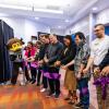 Colorado Gov. Jared Polis, Chip the buffalo mascot and several campus affiliates cut the ribbon at the gaming center grand opening