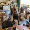 Volunteers from Team Rubicon load up CU Boulder PPE donations on Friday, April 13, 2020. (Sam Bogan/CU Boulder)