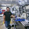 Behruzkhon Rashidov, President and founder of the CU Boulder Racing Team, works in the Idea Forge Machine shop.