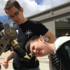 Kid looks through telescope as part of CU-STARs project